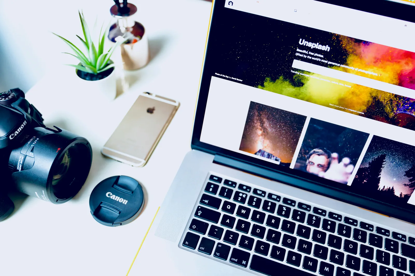 Desk with a laptop and notes