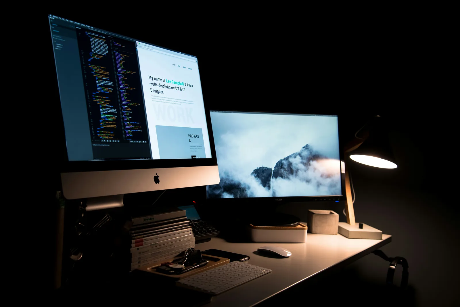 Workstation with a website open in the browser and the code beside it